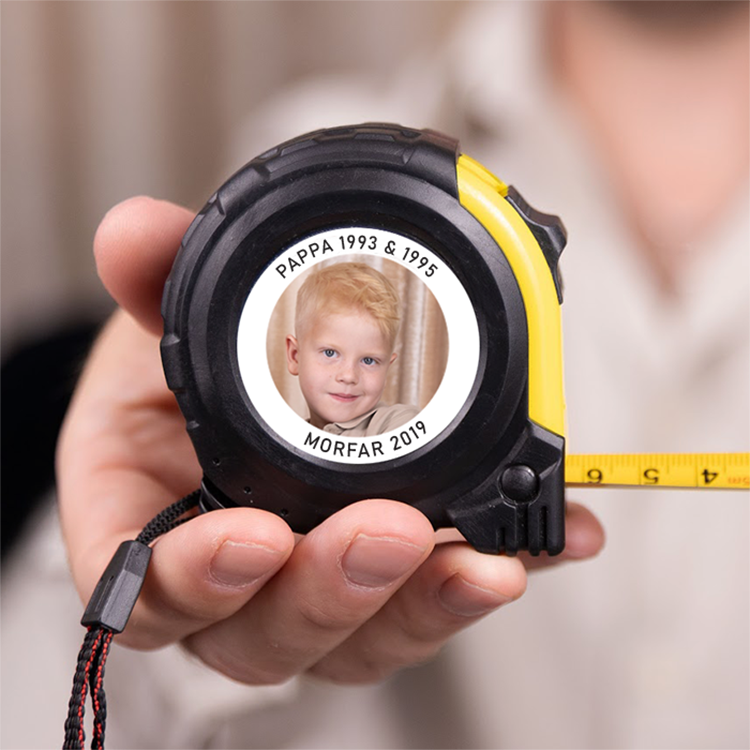 Måttband med text och foto