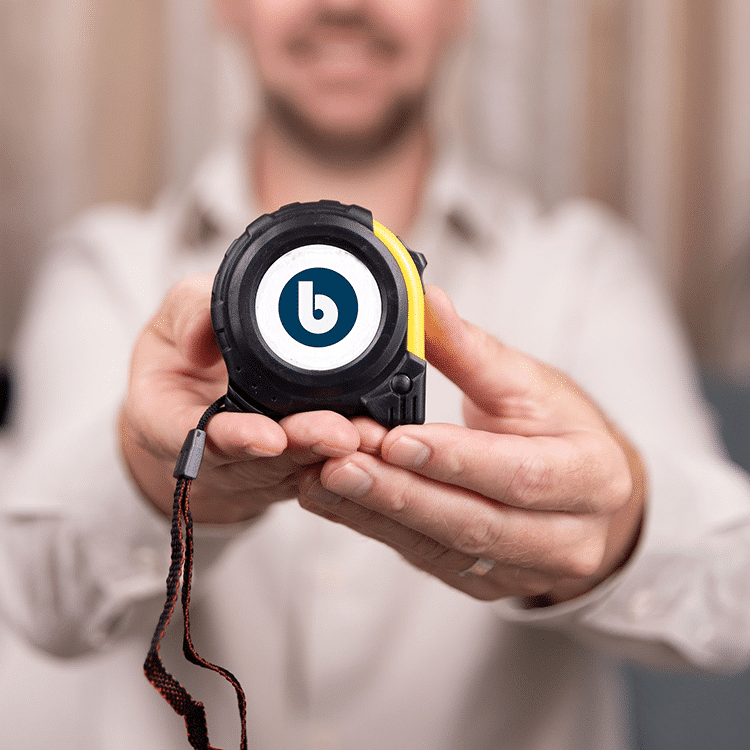 Måttband med logotyp