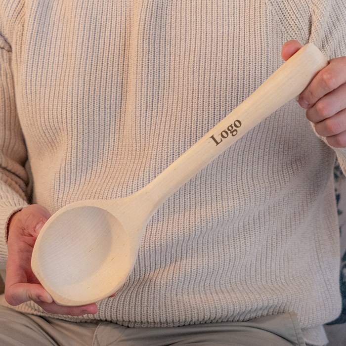 Bastuskopa med logotyp