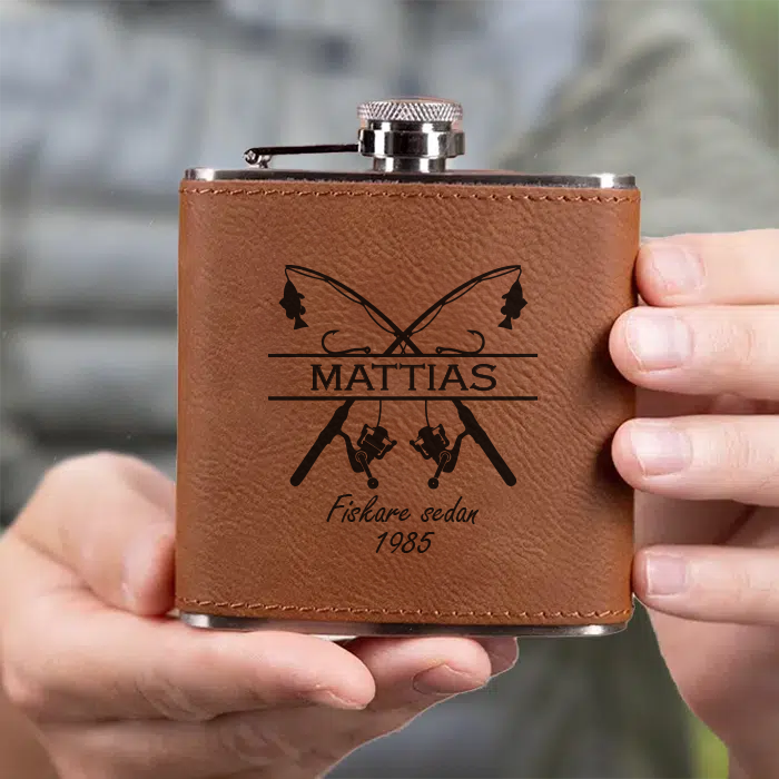 Fickplunta med gravyr, fiske